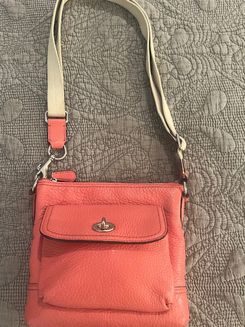 Y2K Coach Pebbled Leather Small Crossbody Turn Lock Bag in a Salmon Peach Color